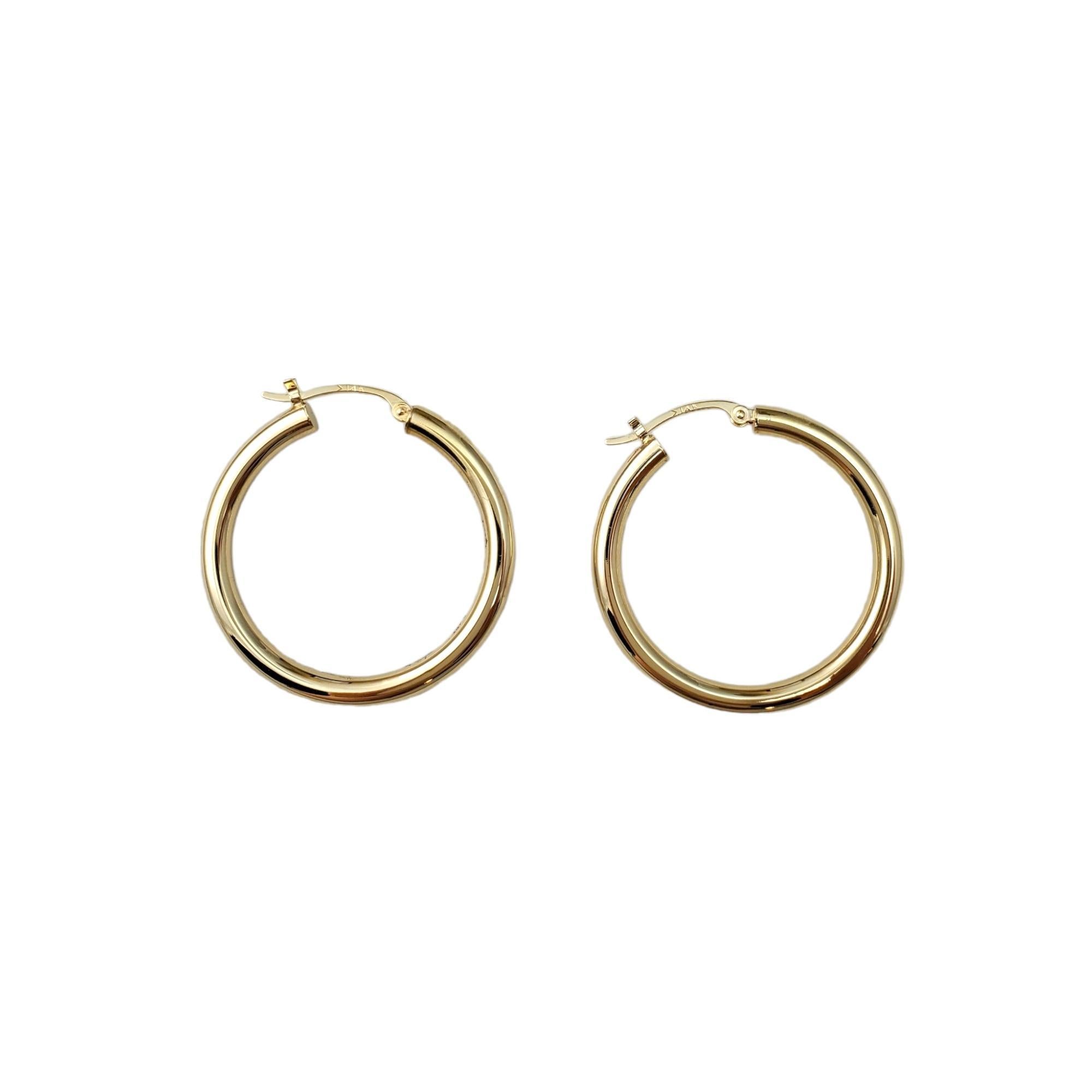 14K Yellow Gold Circle Hoop Earrings -

These classic hoop earrings are a beautiful addition to your collection.

Size:  31.3 mm X 31.7mm 3.1 mm

Hang approx. 1 1/4