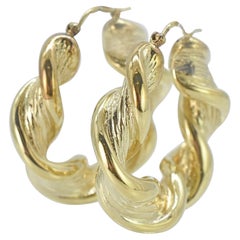 Orecchini a cerchio in oro giallo 14k