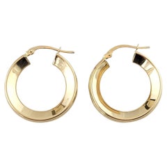 Orecchini a cerchio in oro giallo 14k