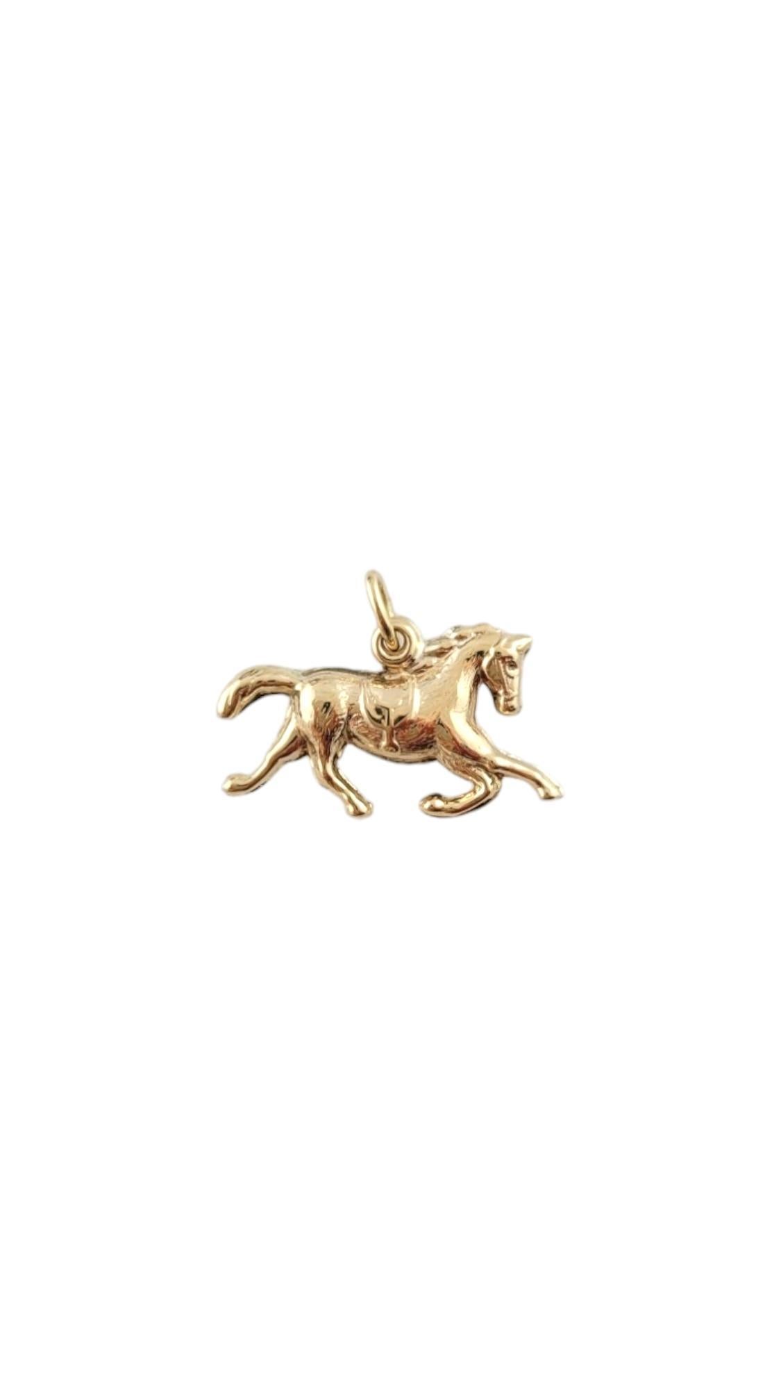 14 Karat Yellow Gold Horse Charm -

Show your equestrian side with this gorgeous horse charm, crafted in 14k yellow gold. 

Size: 19.8 mm x 11.7 mm x 3.3 mm. 

Stamped: 14K

Weight: 0.6 dwt./ 1.0 gr.

*Chain not included. 

Very good condition,