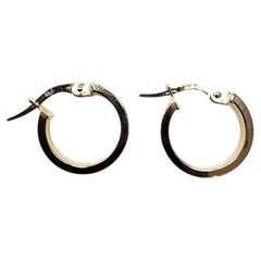 Pendientes de aro tipo «huggie» de oro amarillo de 14 quilates n.º 25523
