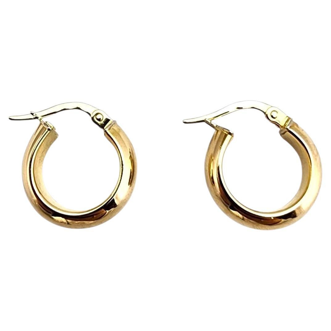 Pendientes de aro abrazador de oro amarillo de 14 quilates #22720