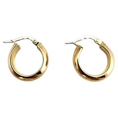 Pendientes de aro abrazador de oro amarillo de 14 quilates #22720