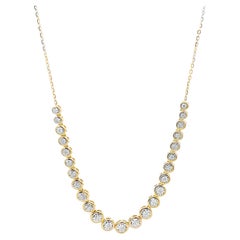 Collar de diamantes engarzados en oro amarillo de 14 quilates