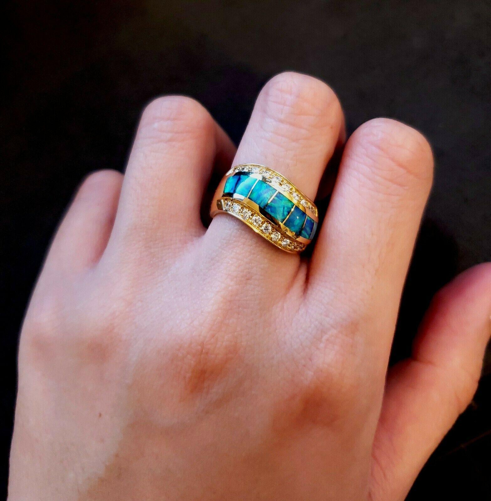 Contemporary 14 Karat Yellow Gold Inlaid Dublet Opal Ring It Consists of 7 Square Opals Lined