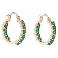 14K Yellow Gold Inside-Out Hoop Earrings Featuring 1.36ctw Round Emeralds