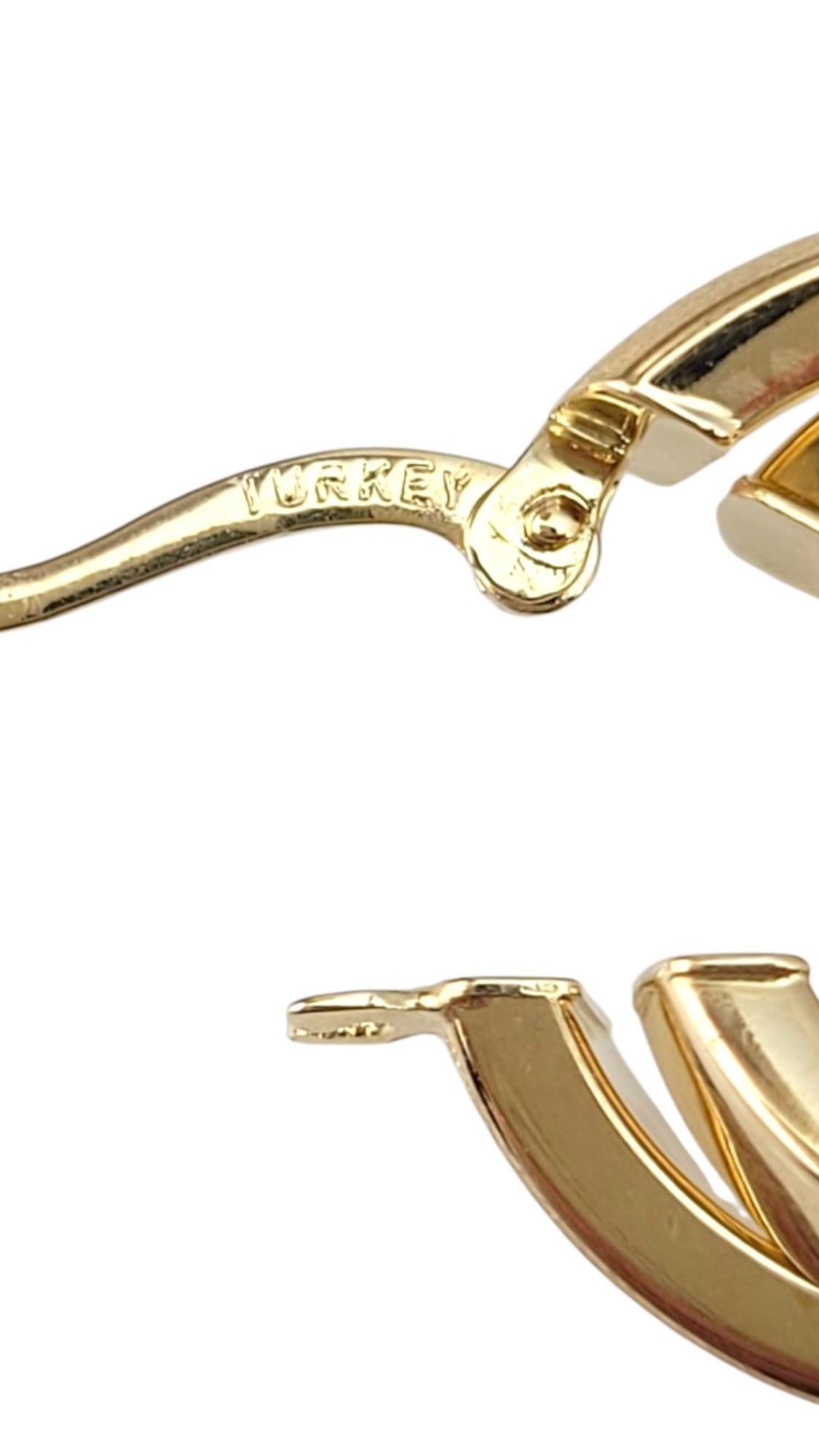 Women's 14K Yellow Gold Interlocked Hoop Earrings #21726 For Sale