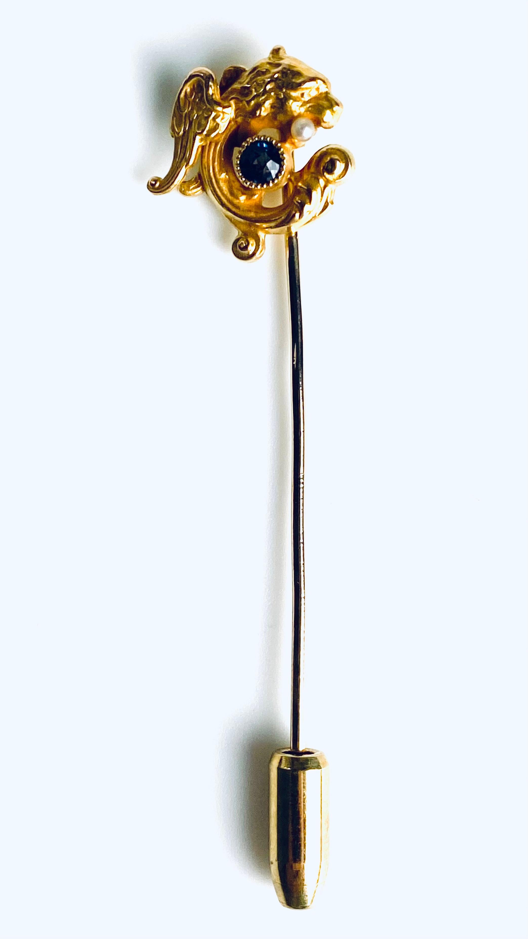 Women's or Men's 14K Yellow Gold Intricately Coiled Fish Brooch with Sapphire in his Mouth For Sale