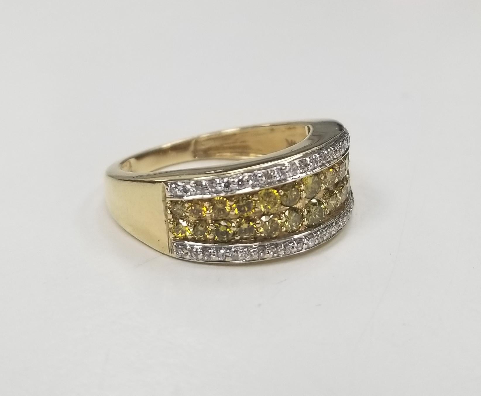 14k yellow gold 4 rows of multi colored diamonds, containing 72 round cut  weighing 1.33cts.  ring size is an 7 and can be sized to fit for free. 
