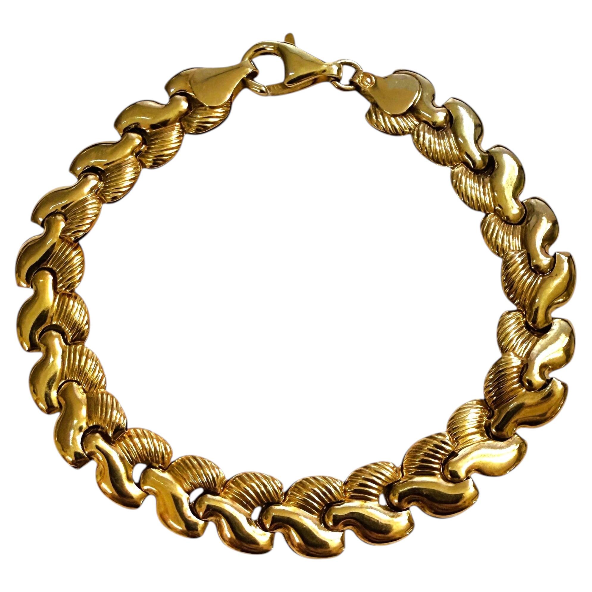 What are the thick bracelets called?