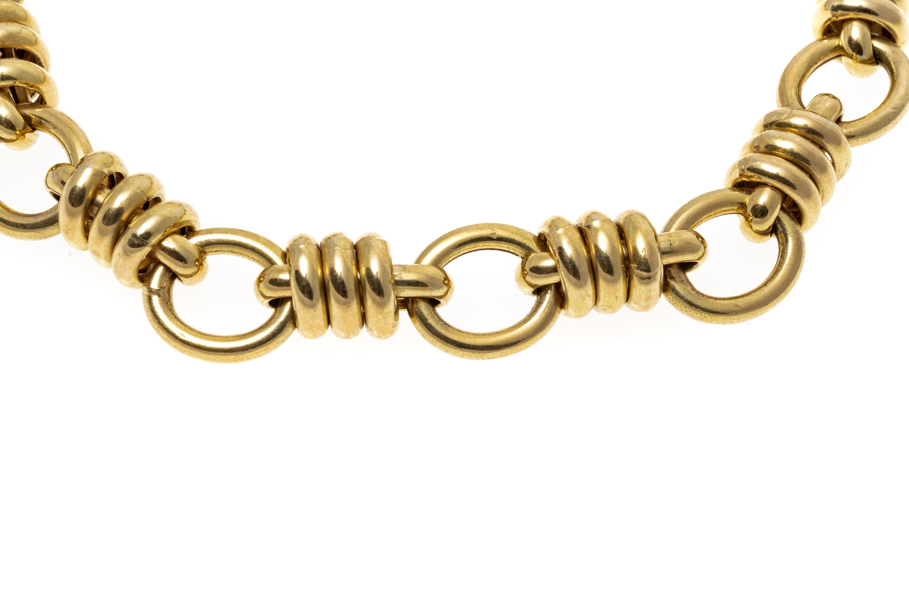 Contemporary 14K Yellow Gold Alternating Circular and Bar Link Bracelet For Sale