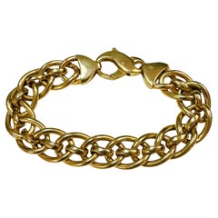 Pulsera gruesa entrelazada italiana de oro amarillo de 14 quilates 22,87 gramos  7.25 pulgadas