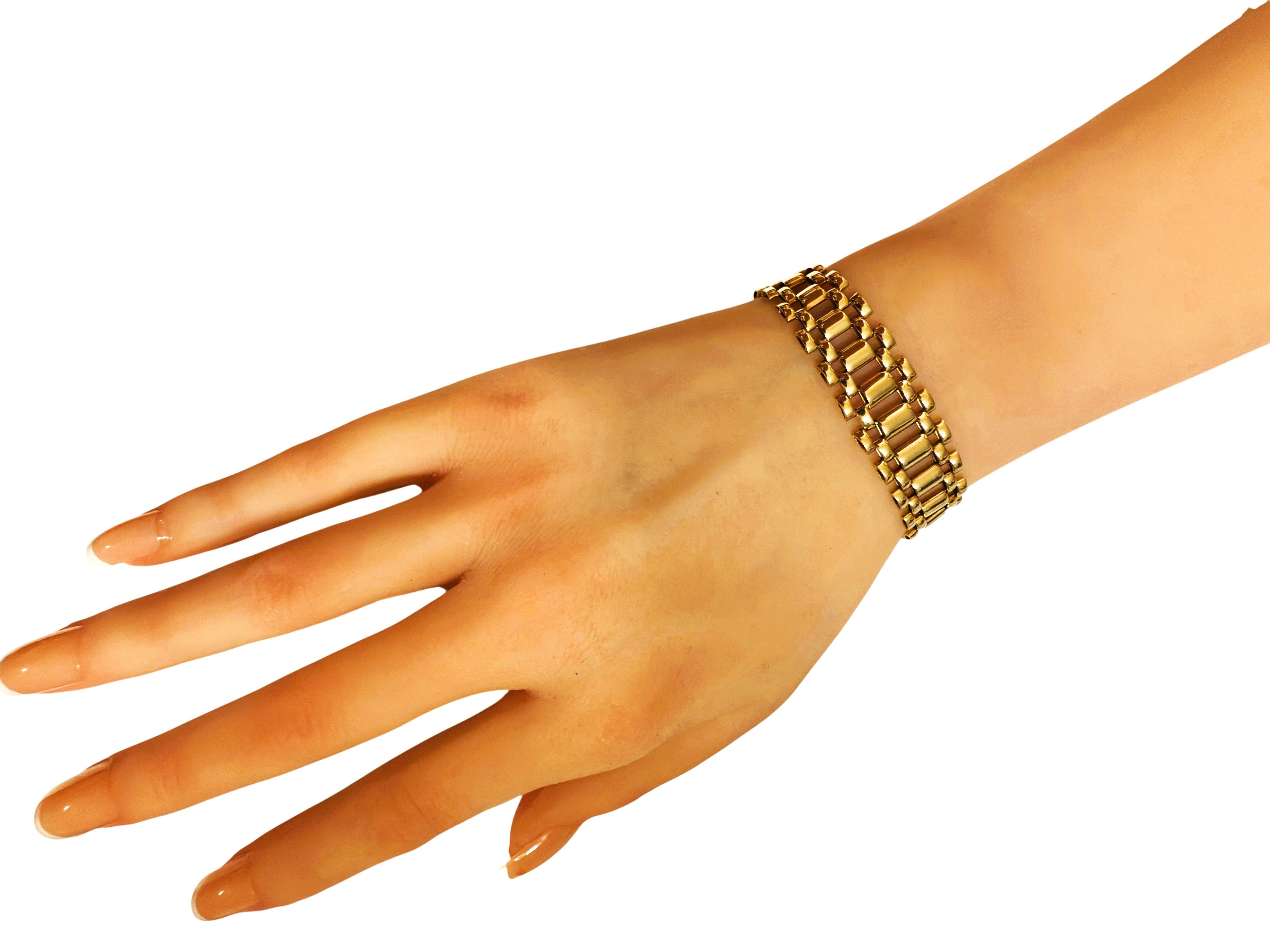 Pulsera italiana de oro amarillo de 14 quilates con banda graduada entrelazada 17,94 gramos en venta 1
