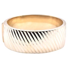 14 Karat Yellow Gold Italian Twist Bangle Bracelet