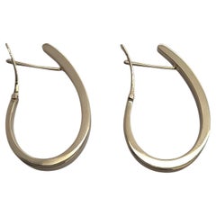 Orecchini a cerchio a forma di J in oro giallo 14k #23820