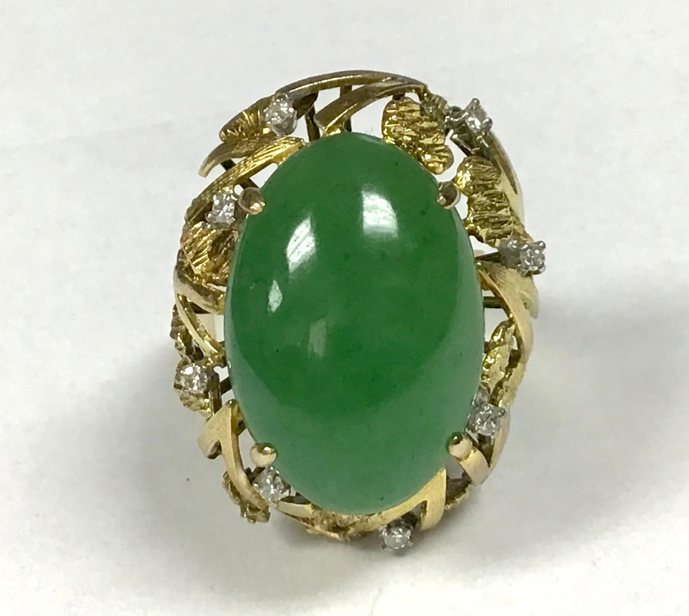 14k yellow gold jade and diamond cocktail ring, 11.00 Grams TW. Approximately 10 Carats.
Tested 14k.  Approximate size 4.5.
