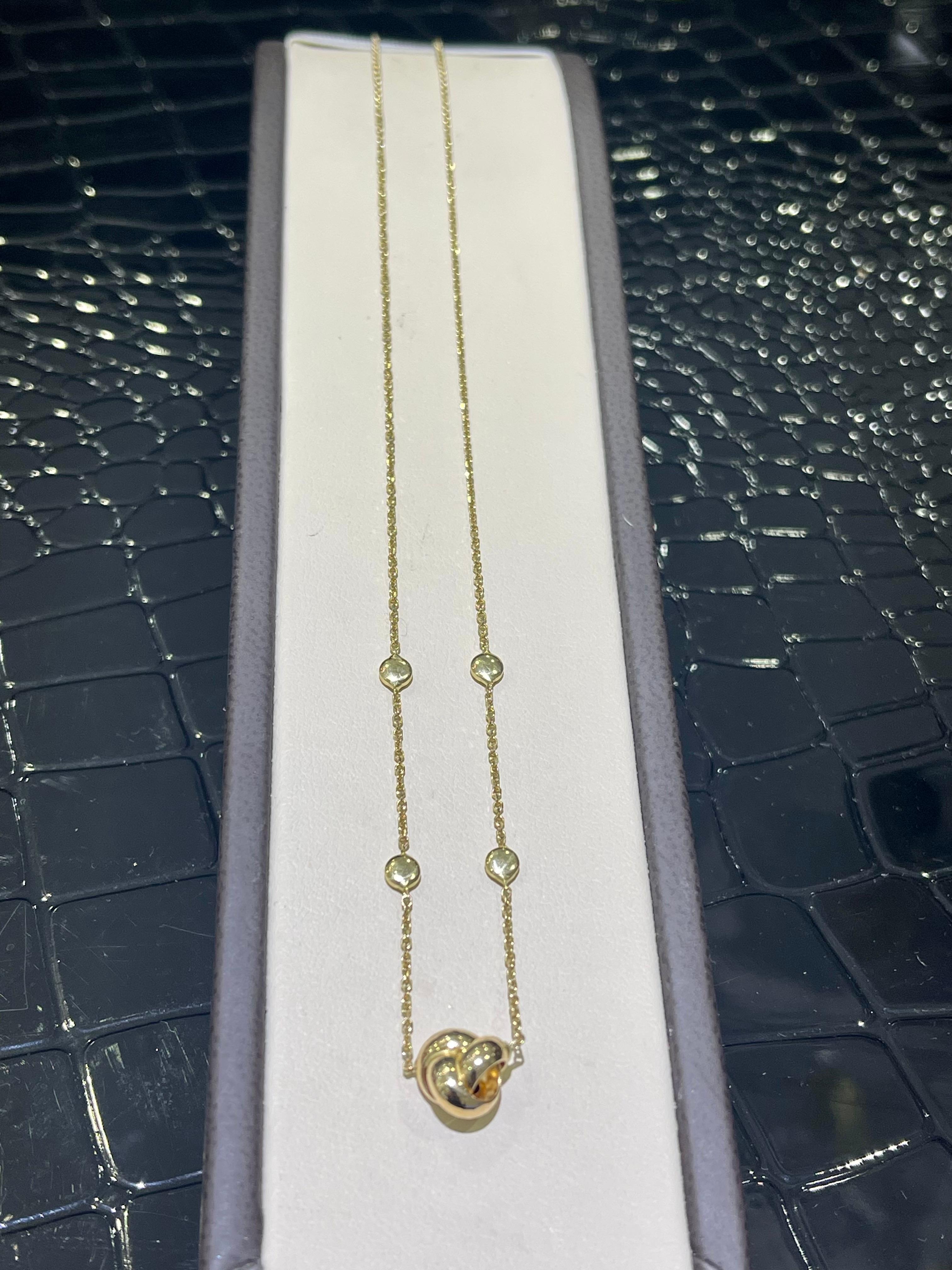 Modern 14k Yellow Gold Knot Necklace  For Sale