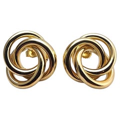 Pendientes de oro amarillo de 14 quilates con nudo #22847