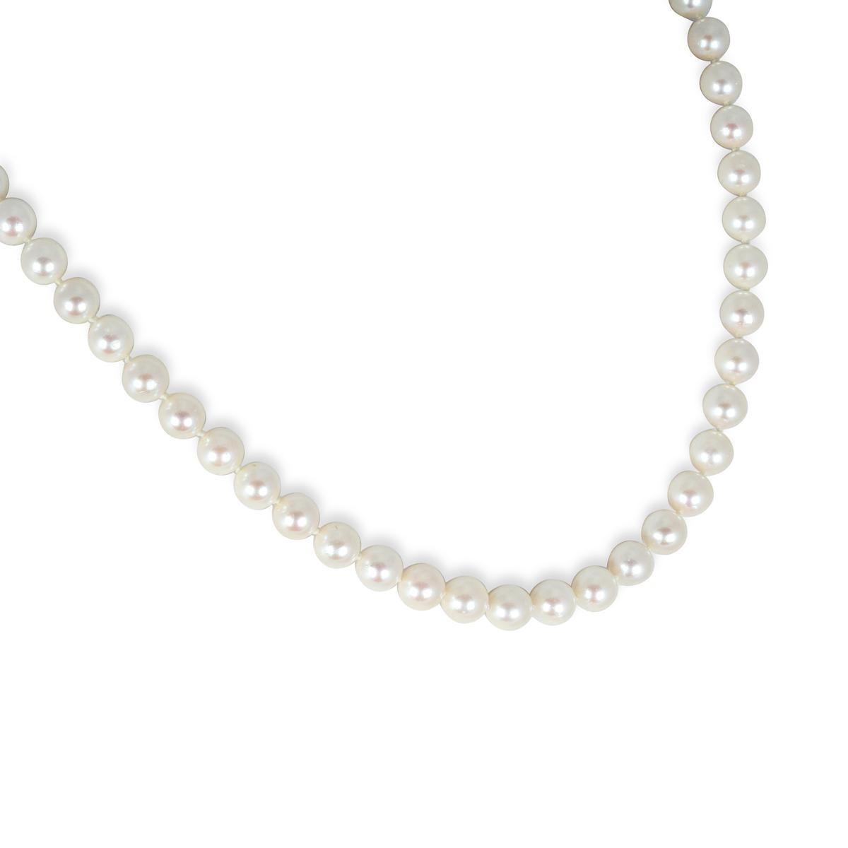 A beautiful 14k yellow gold pearl necklace. The necklace comprises of 56 individually knotted pearls which measure approximately 7mm each, finished with a 14k yellow gold filigree clasp. It measured approximately 18 inches in length and has a gross
