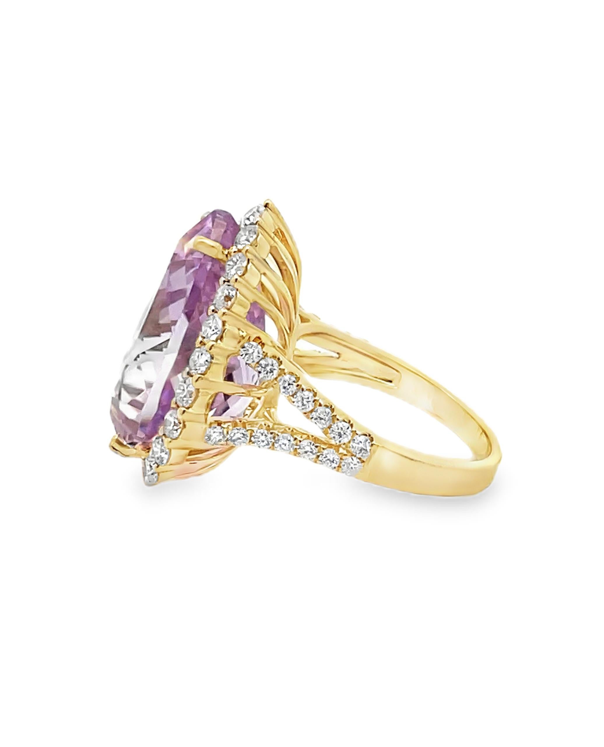 14K yellow gold kunzite halo pear shaped ring with 52 round diamonds weighing 1.67 carats total.  The kunzite is measured at 15.19x20mm.

- Finger Size 6.5