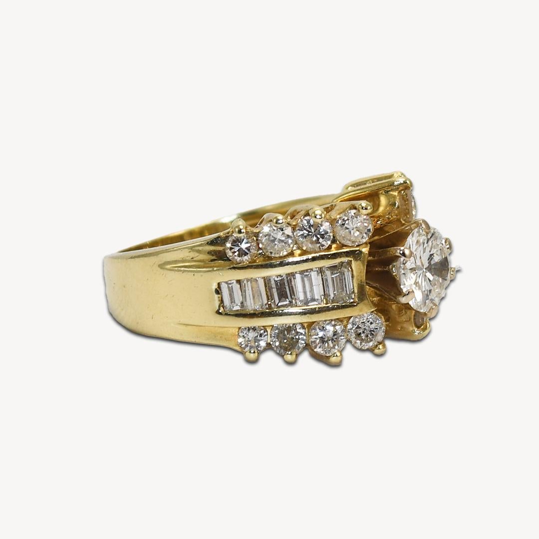 Ladies diamond engagement ring set in 14k yellow gold.
Stamped 14k and weighs 6.3 grams.
The center diamond is a round brilliant cut, .60 carats, G to  H color, Si1 (has a small chip on the edge).
The side diamonds are round brilliants and