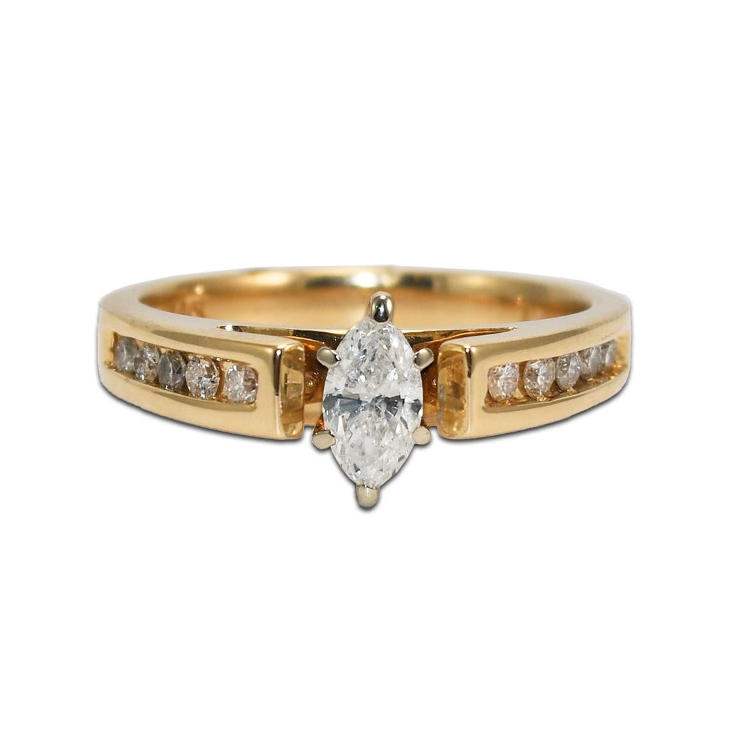 14K Yellow Gold Ladies Marquise Shaped Diamond Ring For Sale
