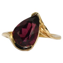 Bague pour femmes en or jaune 14 carats avec grenat rhodolite en forme de poire