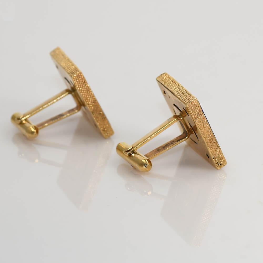 Blue lapis cufflinks with 14k yellow gold settings.
Stamped 14k and weigh 23 grams gross weight. 
Nice bright blue lapis with small flecks of pyrite.
The cufflinks measure 3/4 by 3/4 inches.
Excellent condition.