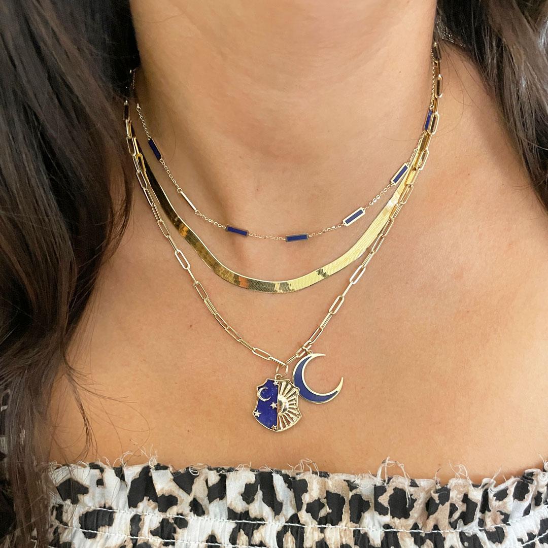 This large herringbone necklace is a must have to elevate any look. A staple in your jewelry collection. This piece can be worn on its own or layered with your favorite chains.

14K Yellow Gold
Chain Length: 18 inches
Weight:  8.3 grams
Measures: 5