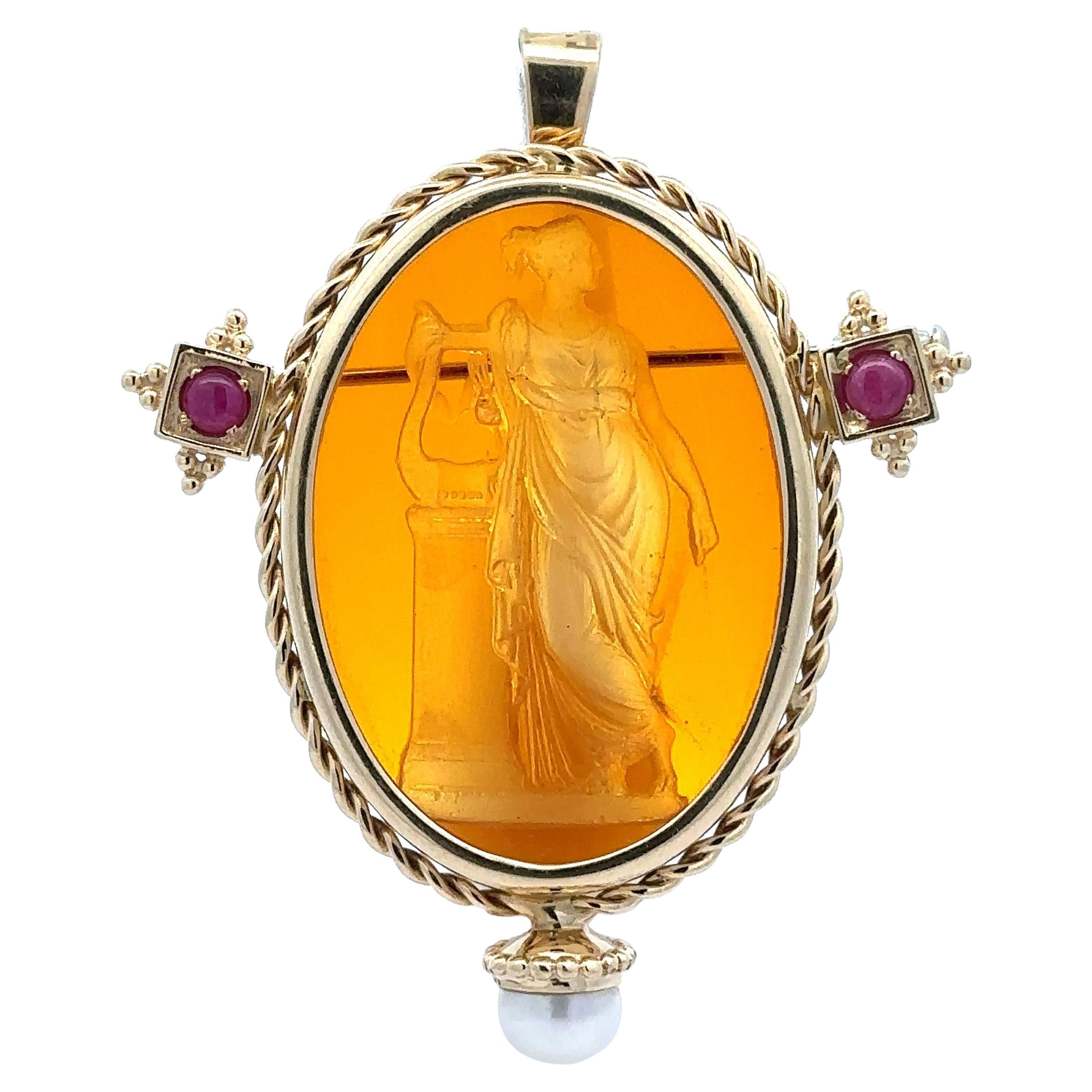 Colgante broche de alambre trenzado de oro amarillo de 14k con gran rubí y perla de cristal calcográfico