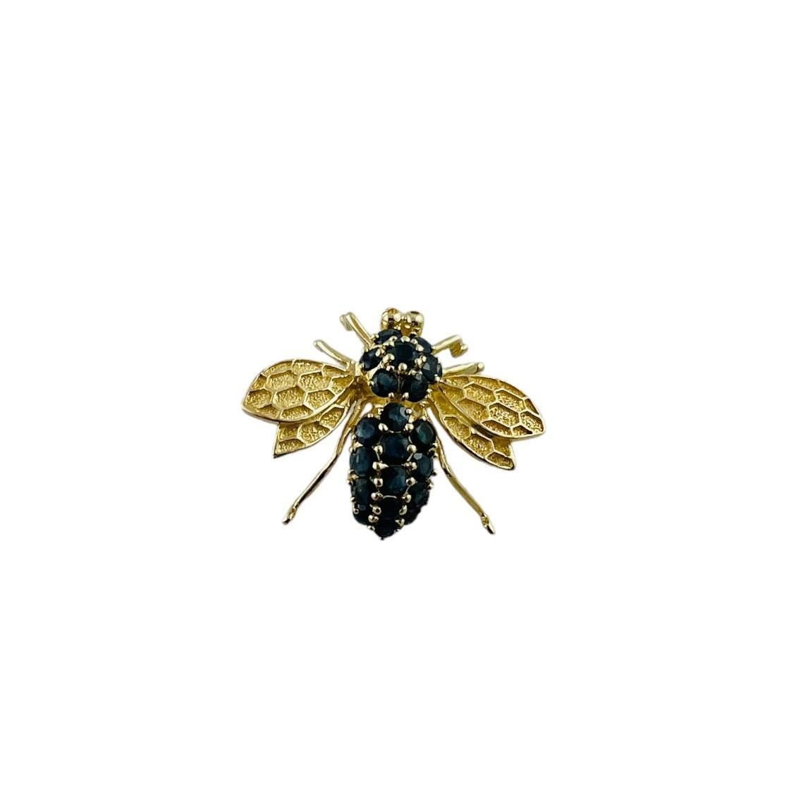 14K Yellow Gold Large Natural Sapphire Bee Brooch / Pendant

This beautiful bee can be worn as a brooch or a pendant.

The brooch is set in 14K yellow gold with 20 dark blue natural sapphires

24.9. x 31.7 x 12.3 mm

6.3 g / 4.0 dwt

Stamped 14K 585