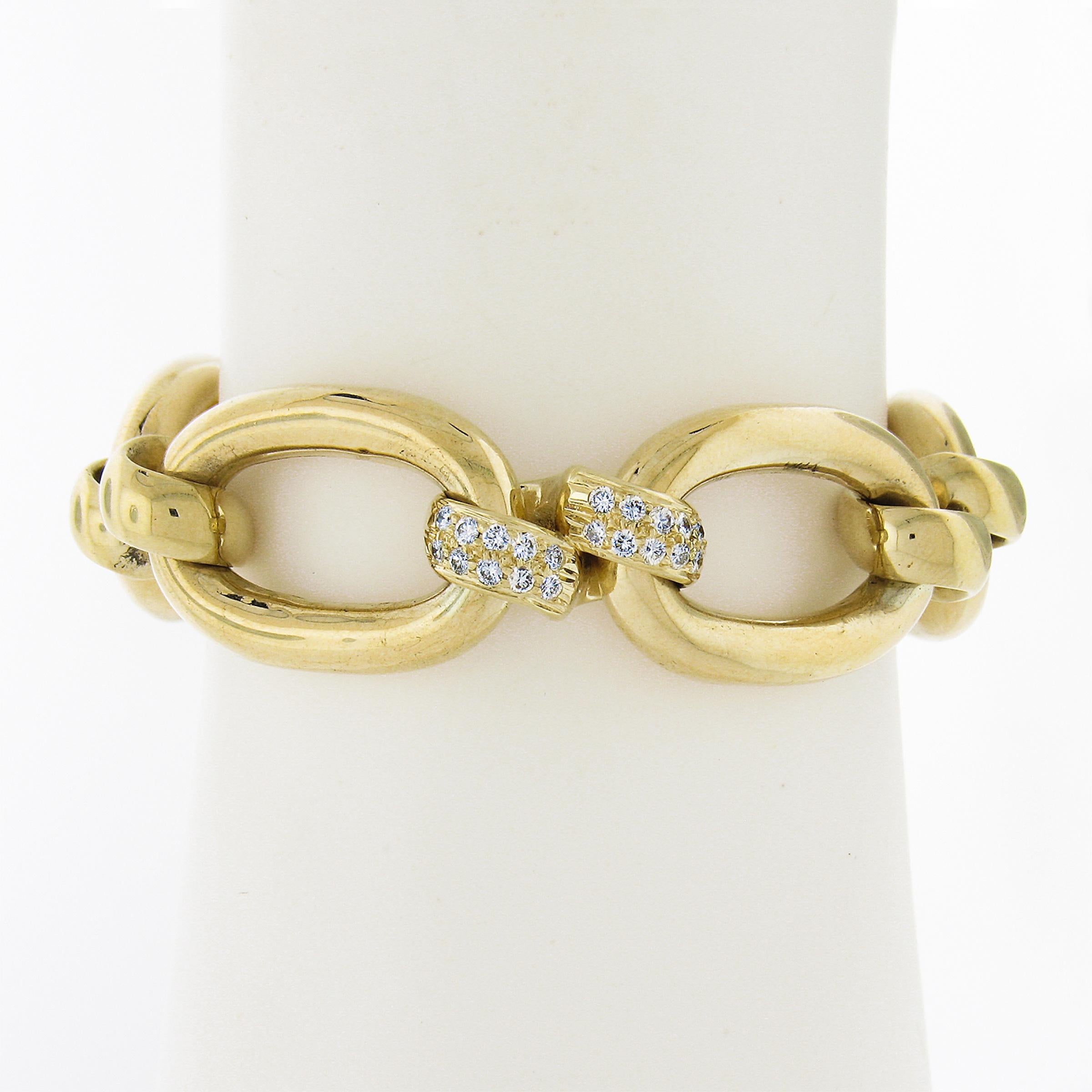 --Stone(s):--
(60) Natural Genuine Diamonds - Round Brilliant Cut - Pave Set - G/H Color - VS1/VS2 Clarity - 0.90ctw (approx.)

Material: Solid 14k Yellow Gold
Weight: 64.63 Grams
Chain Type: Open Oval Links w/ Custom Diamonds Links
Chain