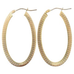 Pendientes acanalados ovalados grandes de oro amarillo de 14 quilates #22916