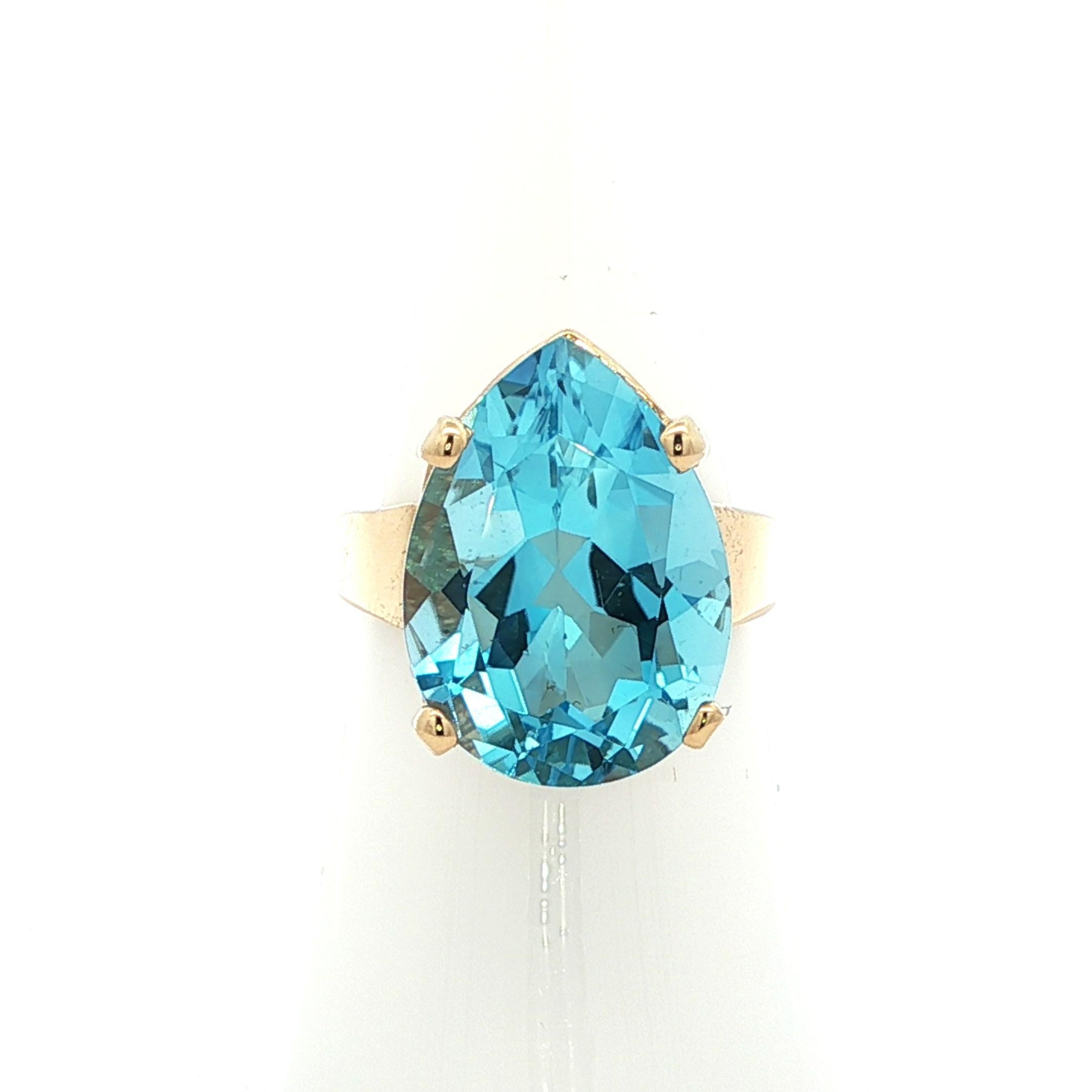 Bague solitaire en or jaune 14k avec topaze bleue suisse en forme de poire