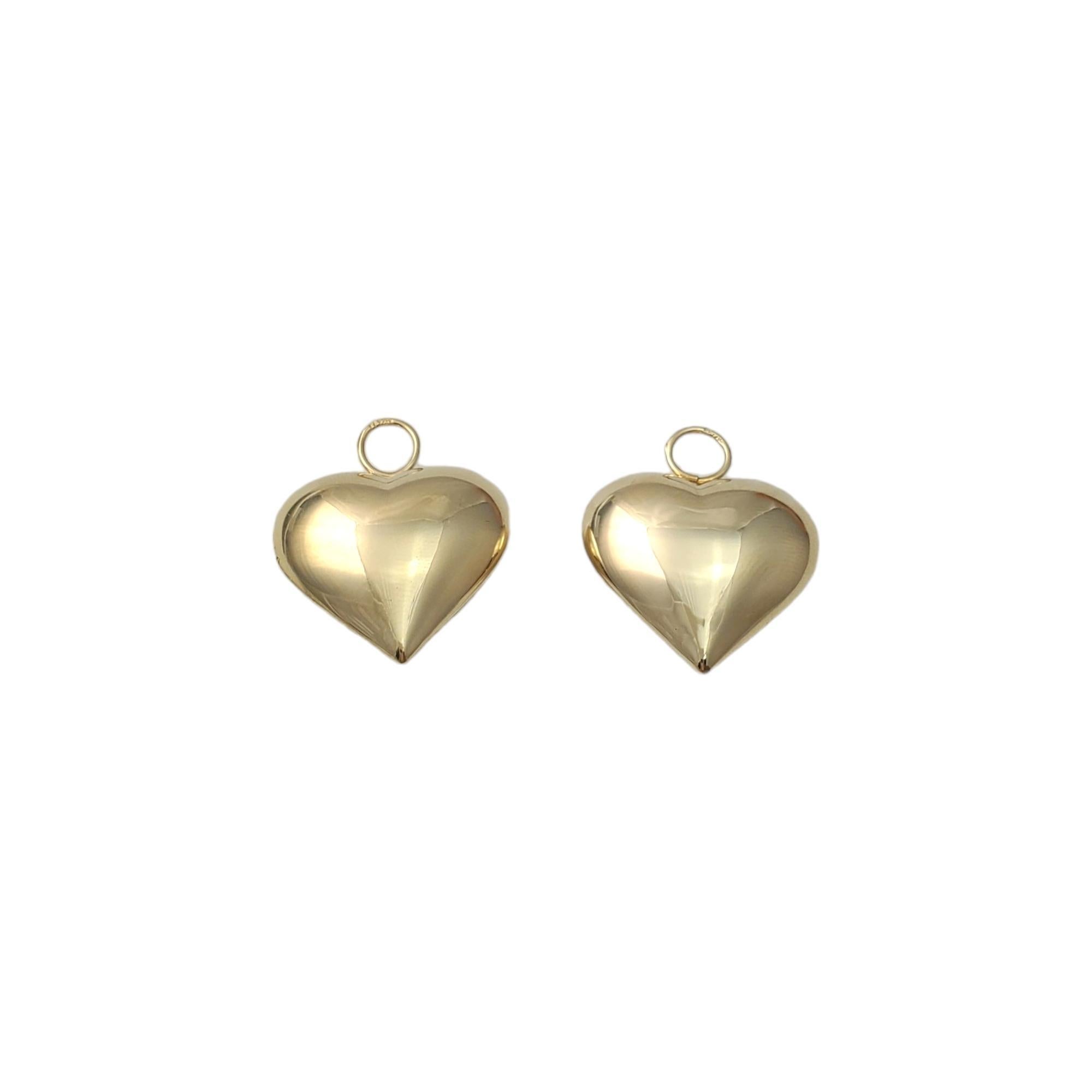 Vintage 14K Yellow Gold Puffy Heart Hoop Accents -

These large hearts are a beautiful addition to any hoops! 

Size:  25.3 mm X 21.1 mm X 9.1 mm

Weight:  1.7 dwt. /  2.9 gr.

Marked: 14K CJ

Very good condition, professionally polished.

Will come