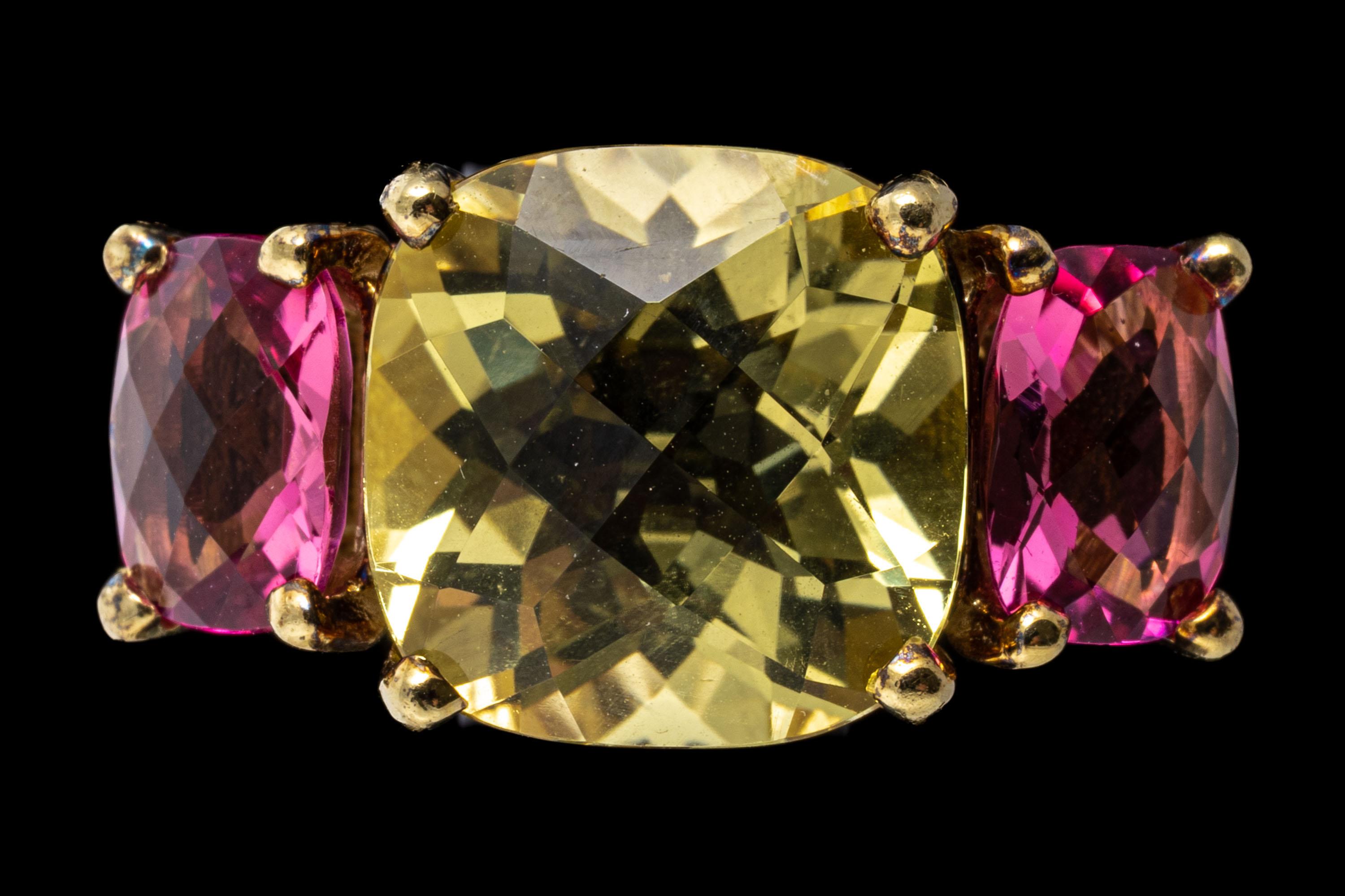 14k yellow gold ring. This gorgeous three stone ring features a center checkerboard cushion, pale lemon lime citrine, approximately 6.49 CTS, flanked by two rectangular checkerboard cut, medium pink color pink tourmalines, approximately 2.18 TCW,