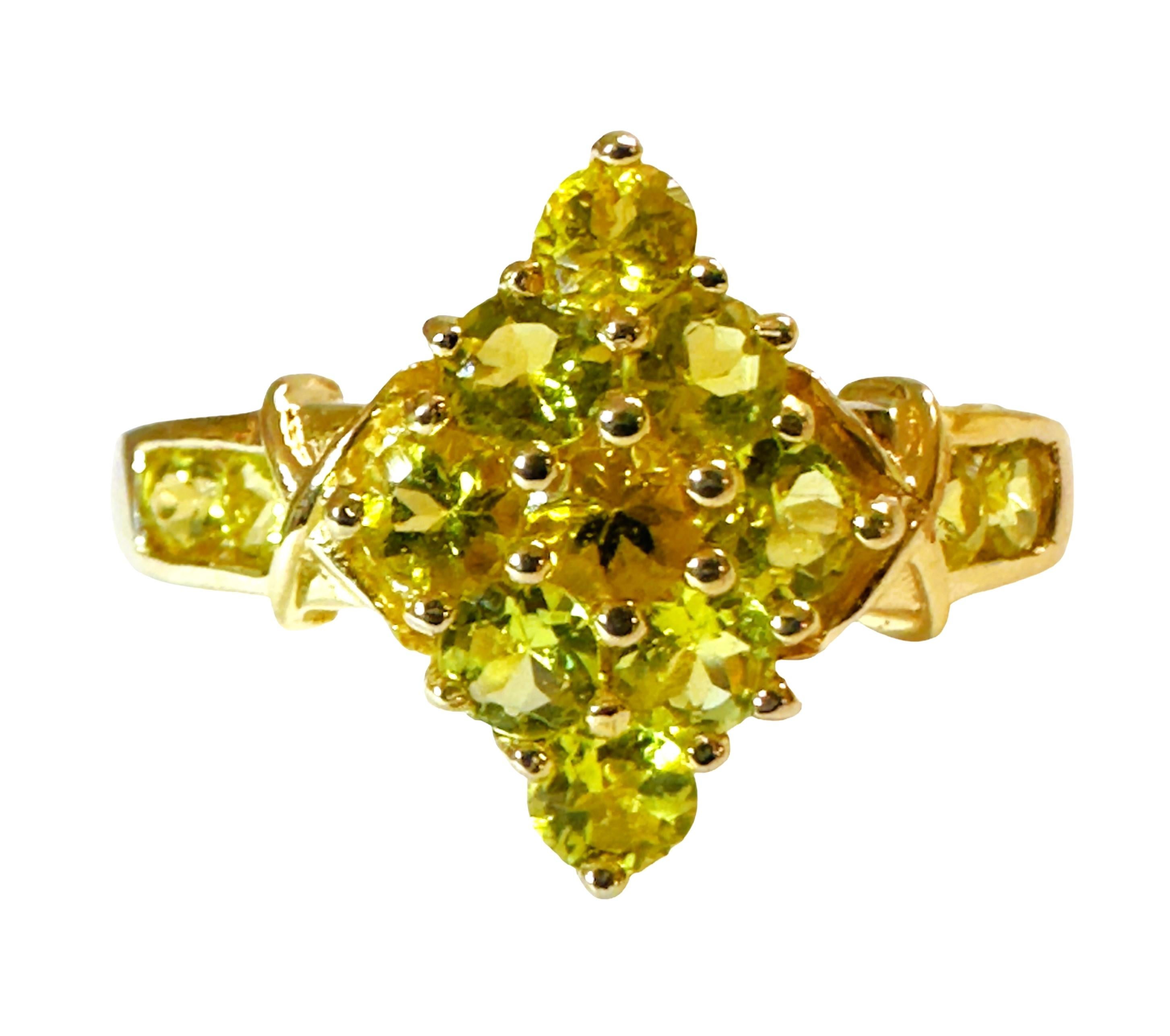 What a stunning ring!   The color of these stones is just gorgeous!  They are Lemon Citrine or otherwise called Green Citrine.  It's such a rare color of stone. The ring is a size 6.75.   It has 13 beautiful round cut citrine stones, 9 are showcased