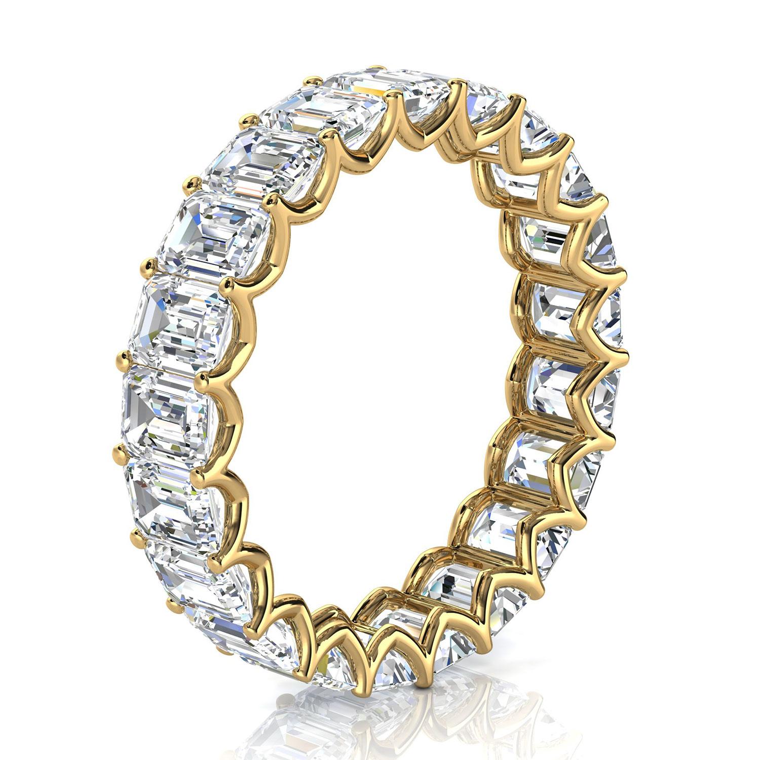 This Elegant Eternity Ring showcase matched 21 Emerald shape Natural Diamonds in an approximate total weight of 4. carat set in floating 