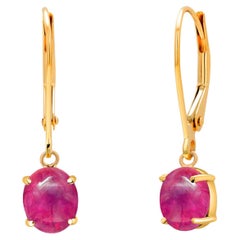 Boucles d'oreilles à levier en or jaune 14 carats avec rubis cabochons assortis de 2,50 carats