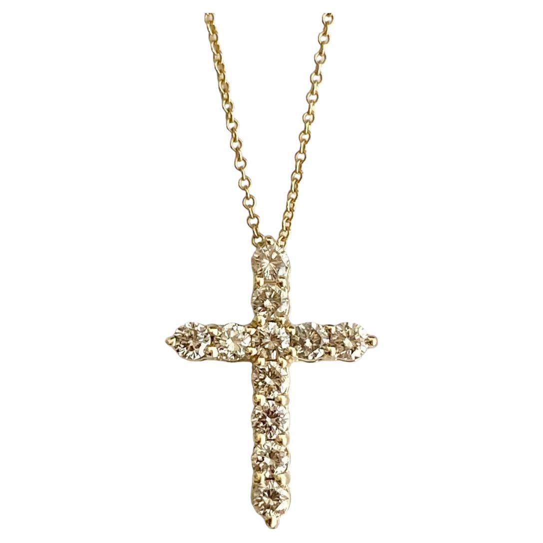 Pendentif croix champagne claire en or jaune 14 carats et diamants