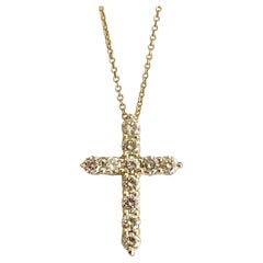 Pendentif croix champagne claire en or jaune 14 carats et diamants