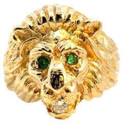 14k Yellow Gold Lions Head Ring with Emerald Eyes and One Round Diamond in Mouth