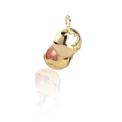 14 Karat Yellow Gold Globe and Round Sandstone Locket Pendant Necklace