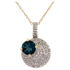 Collier avec pendentif « The Eclipse » en or jaune 14 carats, topaze bleue de Londres et diamants