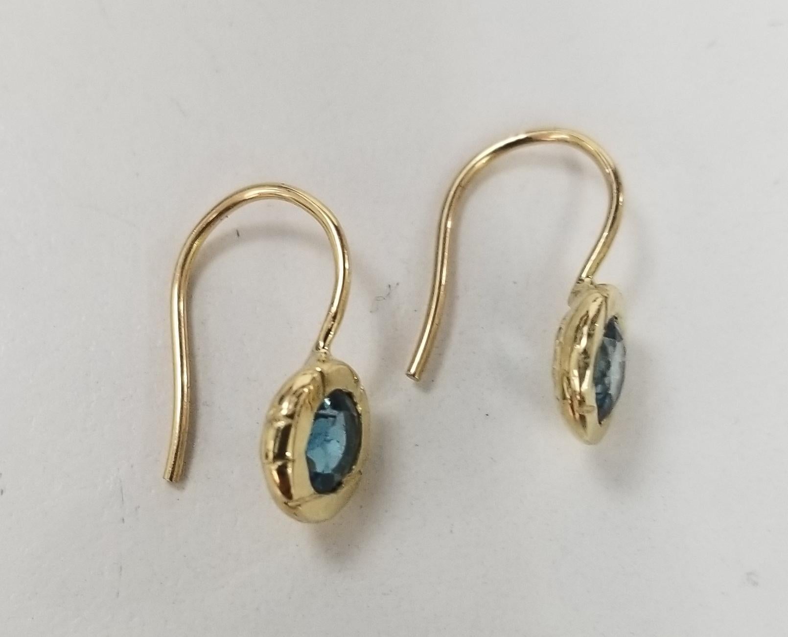 Contemporary 14 Karat Yellow Gold London Blue Topaz Bezel Set Earrings For Sale