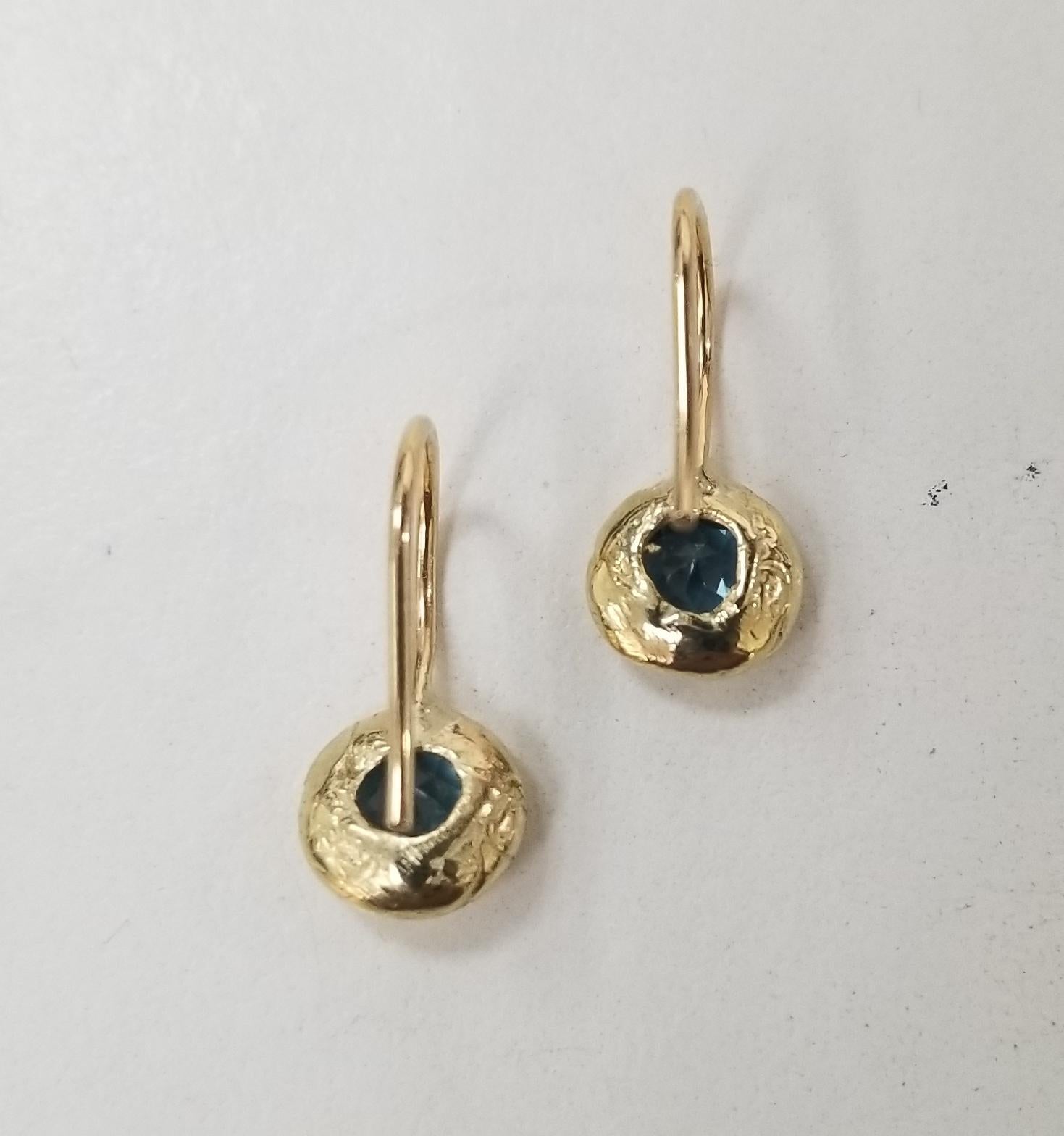 Round Cut 14 Karat Yellow Gold London Blue Topaz Bezel Set Earrings For Sale