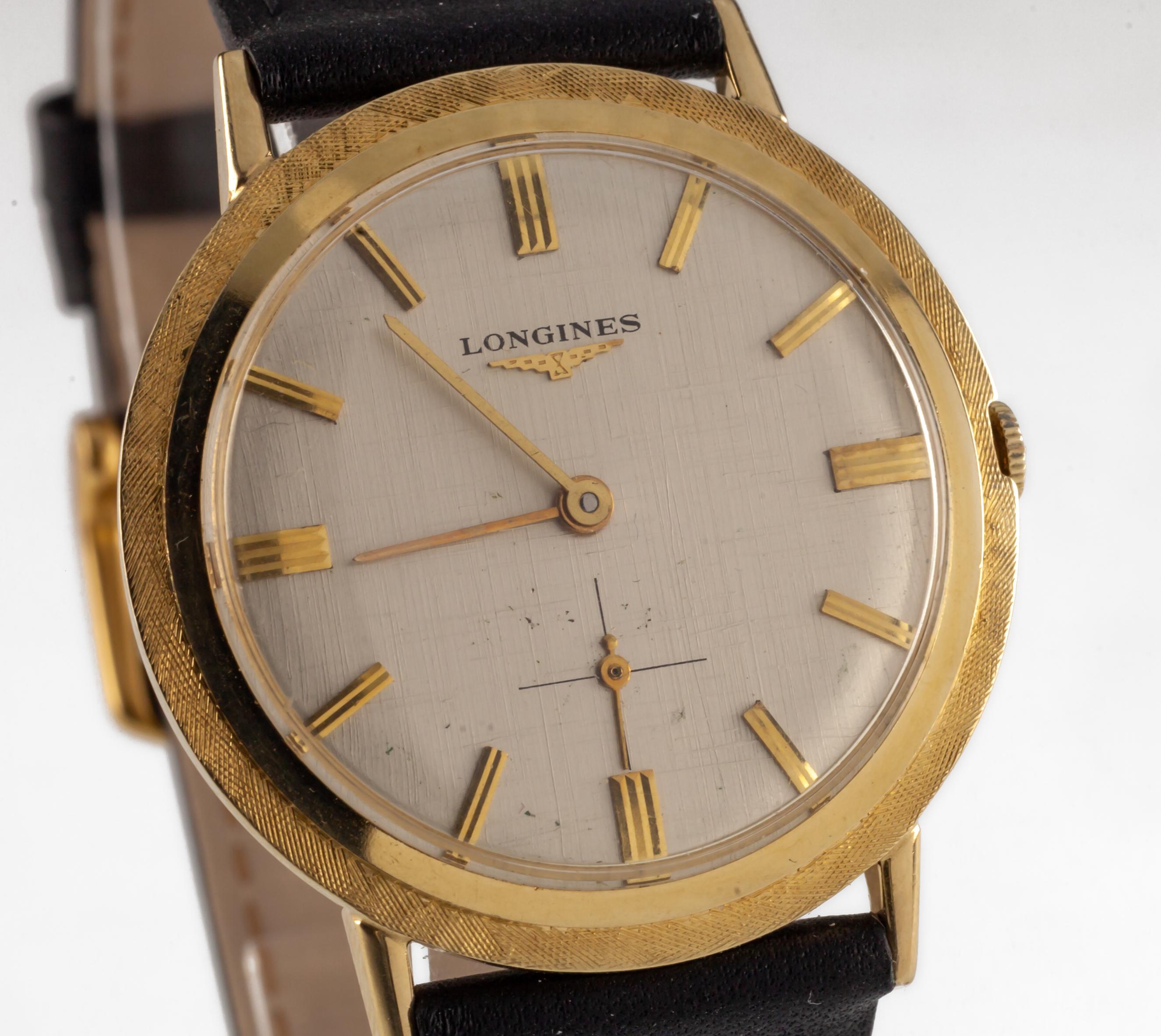 longines hand winding watch