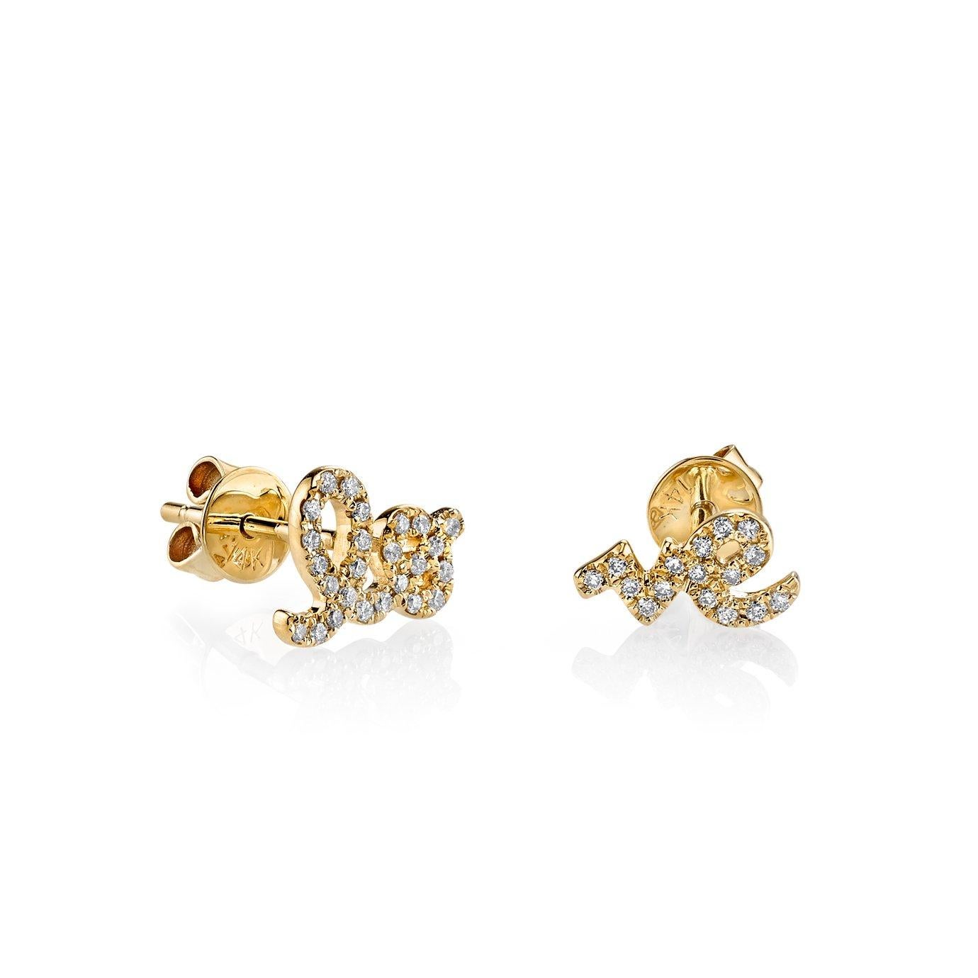 These earrings are a true craft of passion, shaped from 14-karat gold. They artfully depict the word 'Love' in Rosanne Karmes' signature cursive, each letter glistening with 0.11-carats of sparkling diamonds.

14K Yellow Gold
39 Diamonds
Diamonds