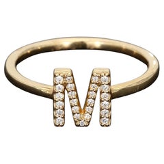 Anello "M" in oro giallo 14k con 0,15 carati di diamanti - Misura 7