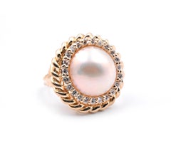 14 Karat Yellow Gold Mabe Pearl and Diamond Halo Twisted Ring
